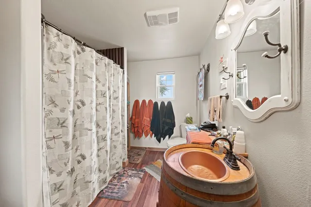 a view of a balcony with chairs