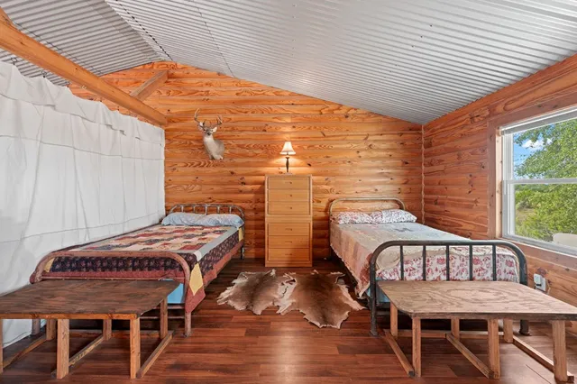 a view of a dining room with furniture and window