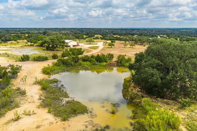 a view of a balcony with wooden floor
