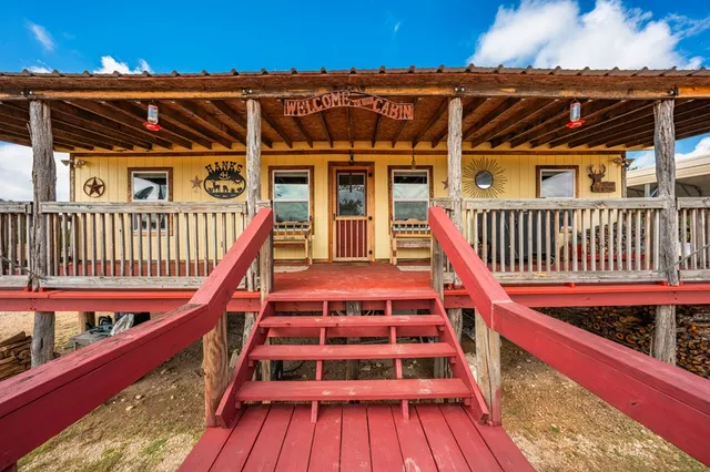 a view of a yard with a lake view