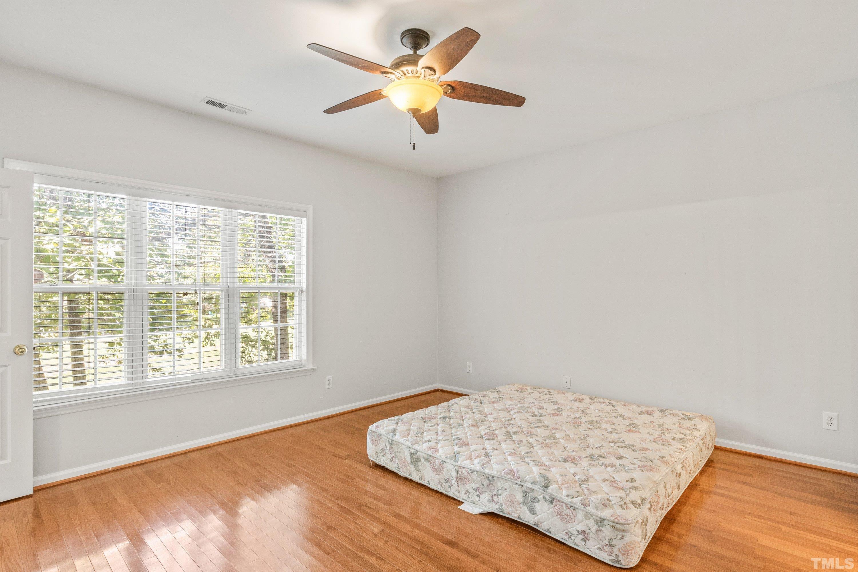 5355 Sahalee Way Raleigh, NC 27604 - Photo 27 of 42 a view of workspace with wooden floor and a window