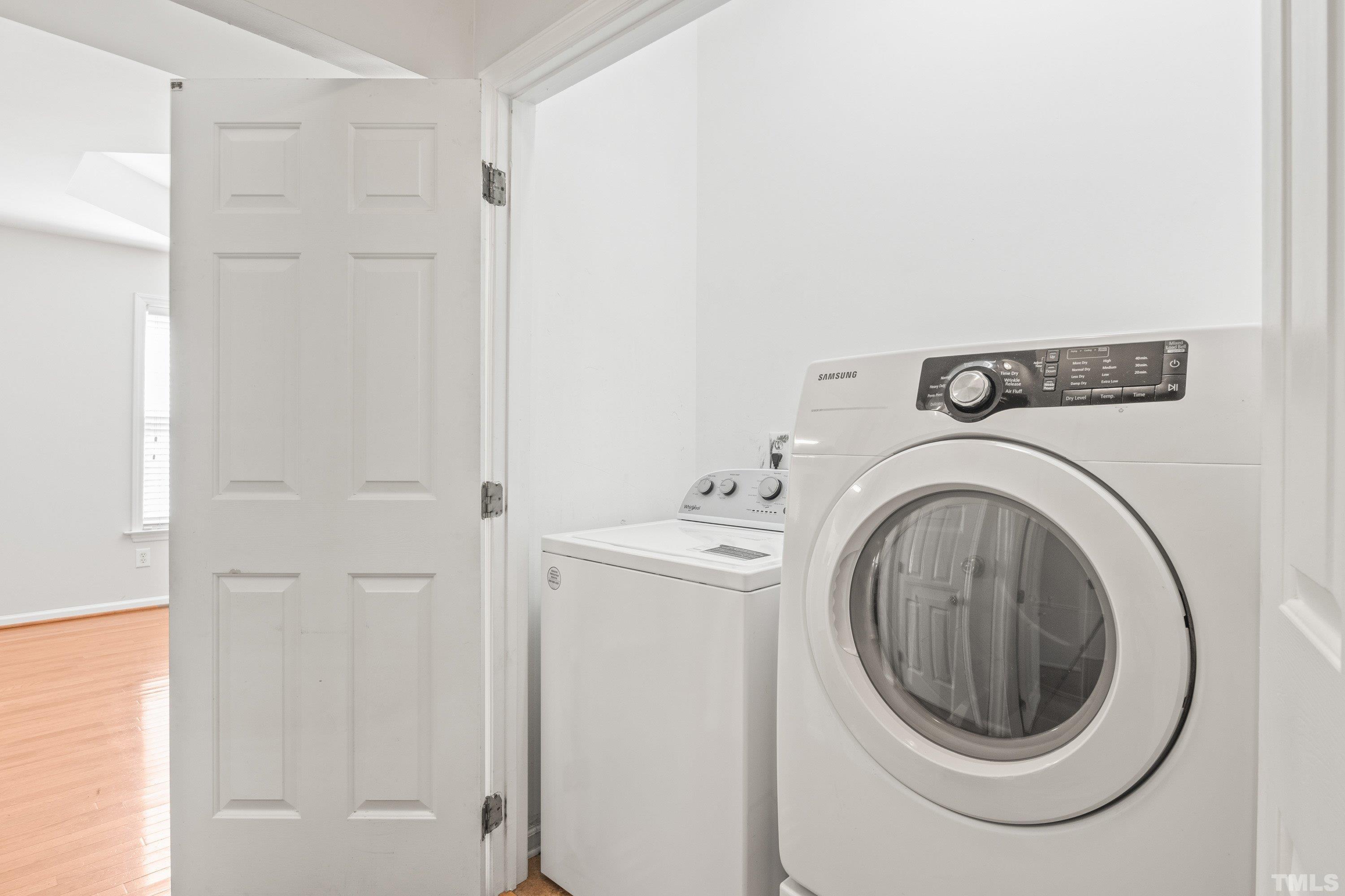 5355 Sahalee Way Raleigh, NC 27604 - Photo 36 of 42 a utility room with dryer and washer