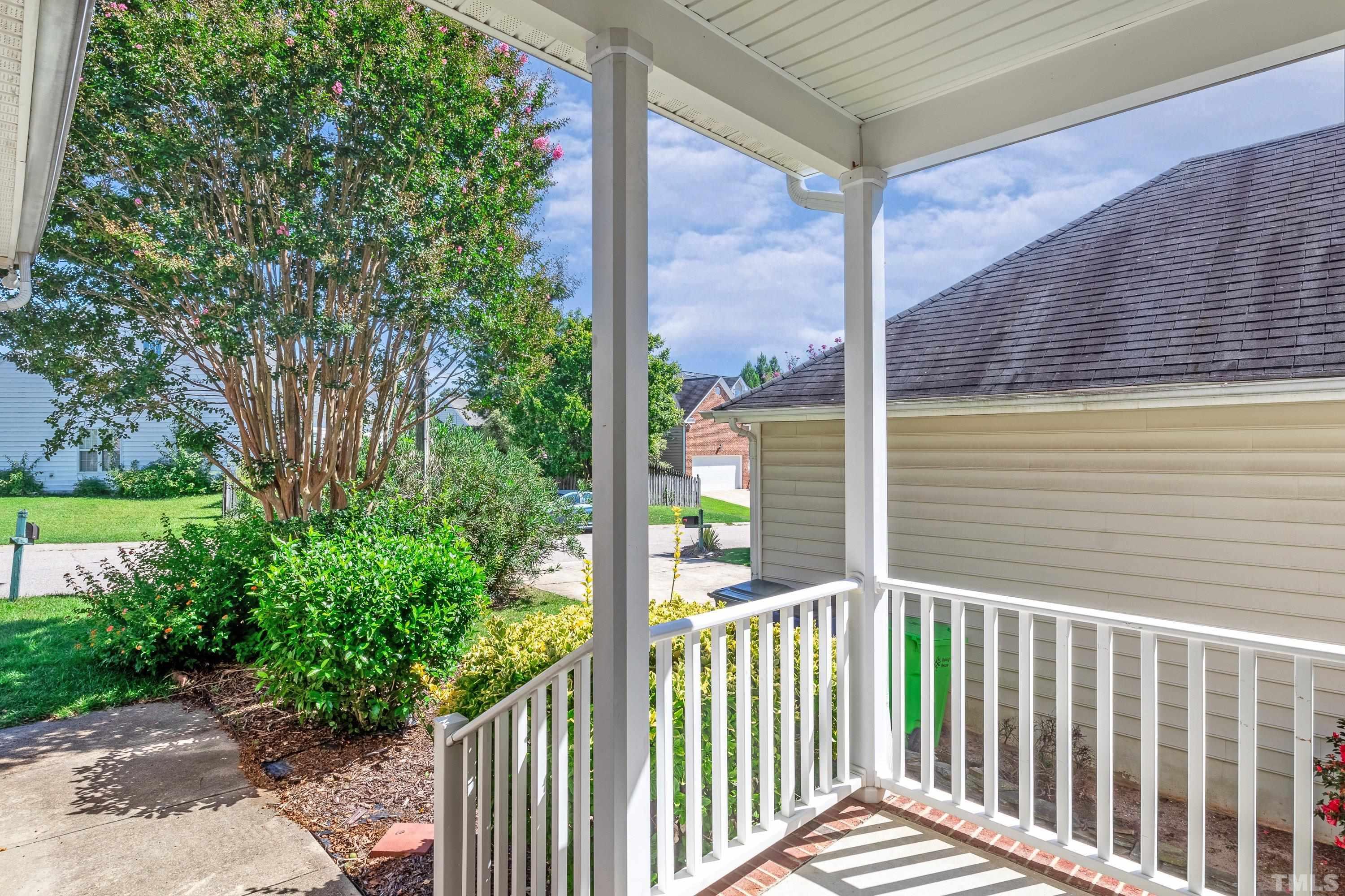 5355 Sahalee Way Raleigh, NC 27604 - Photo 4 of 42 a view of a balcony with a floor to ceiling window and tree
