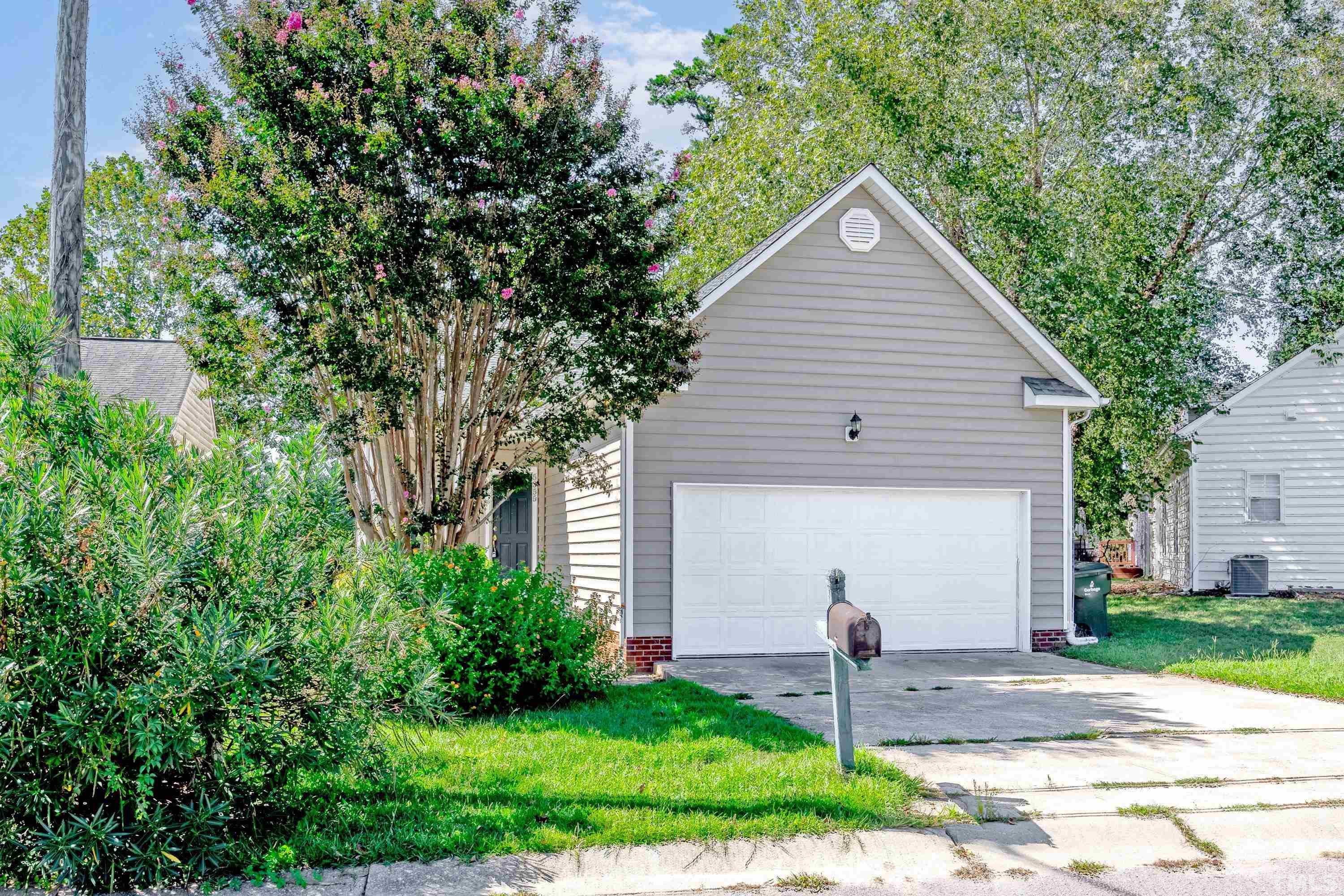 5355 Sahalee Way Raleigh, NC 27604 - Photo 41 of 42 a front view of a house with garden
