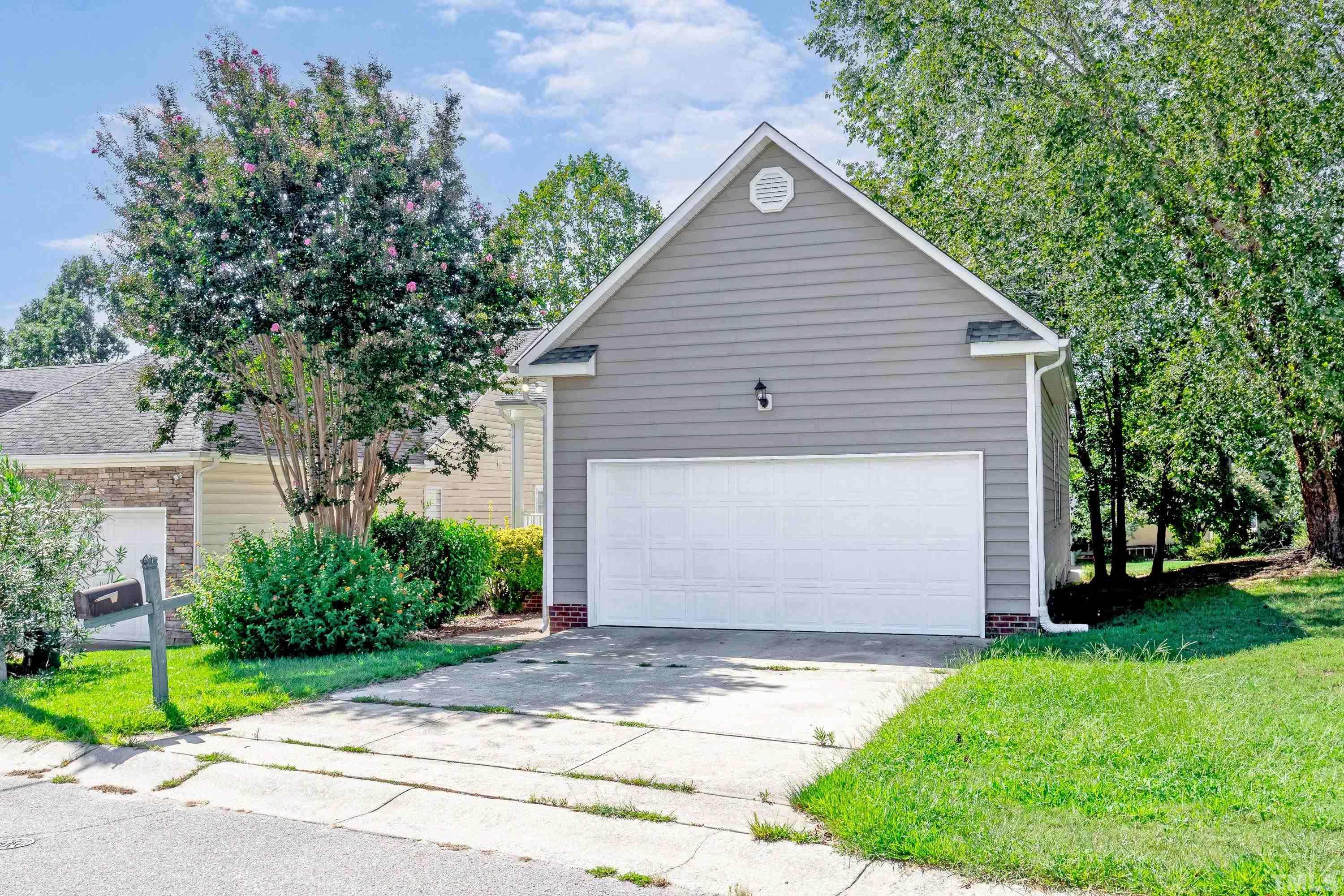 5355 Sahalee Way Raleigh, NC 27604 - Photo 42 of 42 a front view of house with garage and yard
