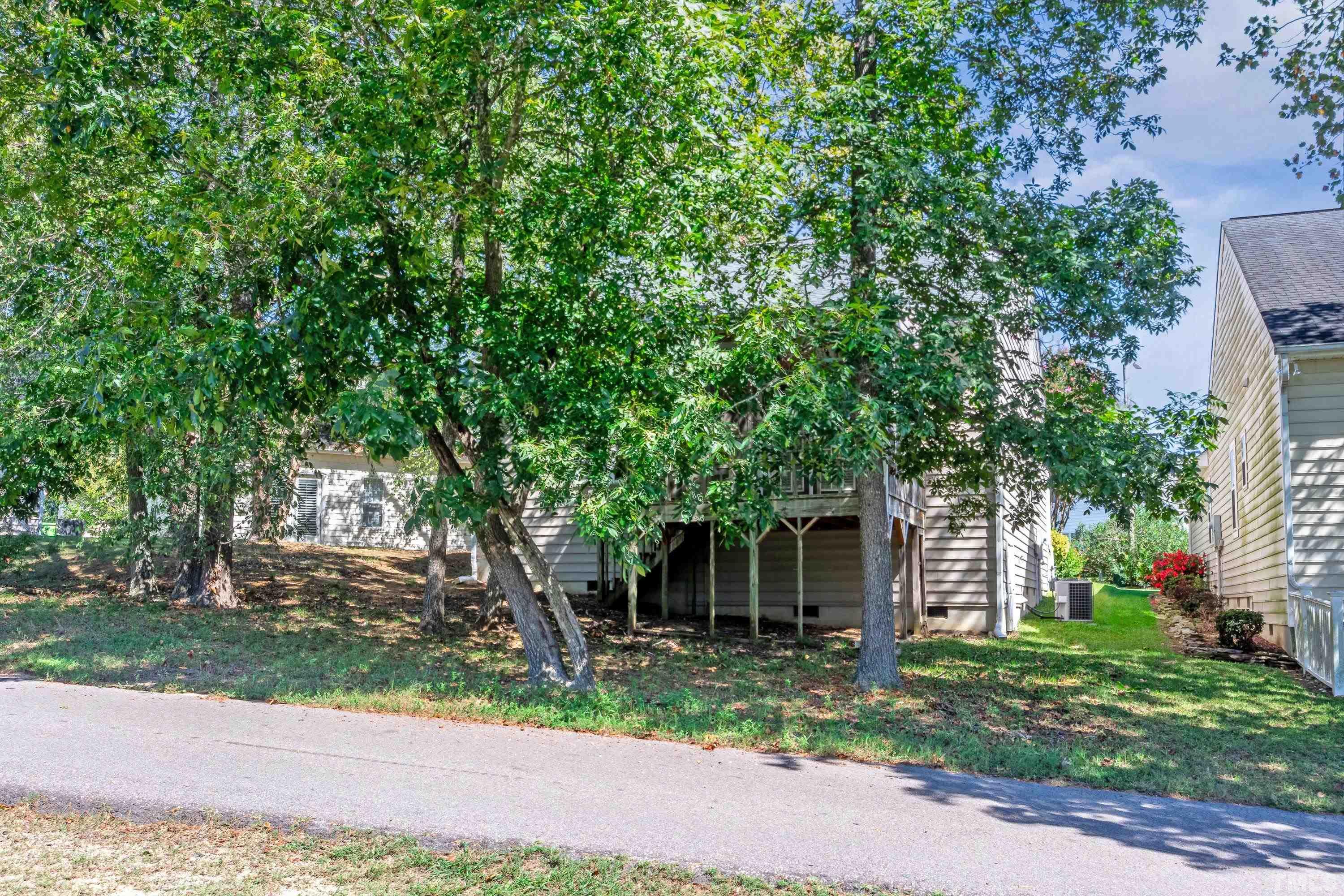 5355 Sahalee Way Raleigh, NC 27604 - Photo 7 of 42 a front view of a house with a yard and a garage