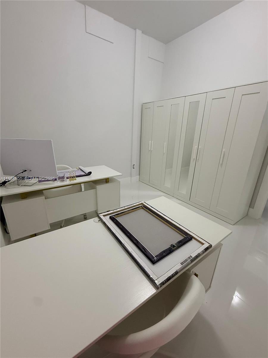 15455 Southwest 232nd Street, Unit A Miami, FL 33170 - Photo 11 of 12 a room with storage and utility