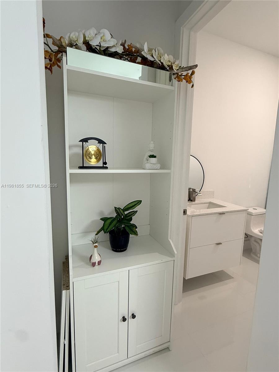 15455 Southwest 232nd Street, Unit A Miami, FL 33170 - Photo 4 of 12 a utility room with dryer and washer