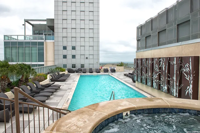 a view of a backyard with sitting area