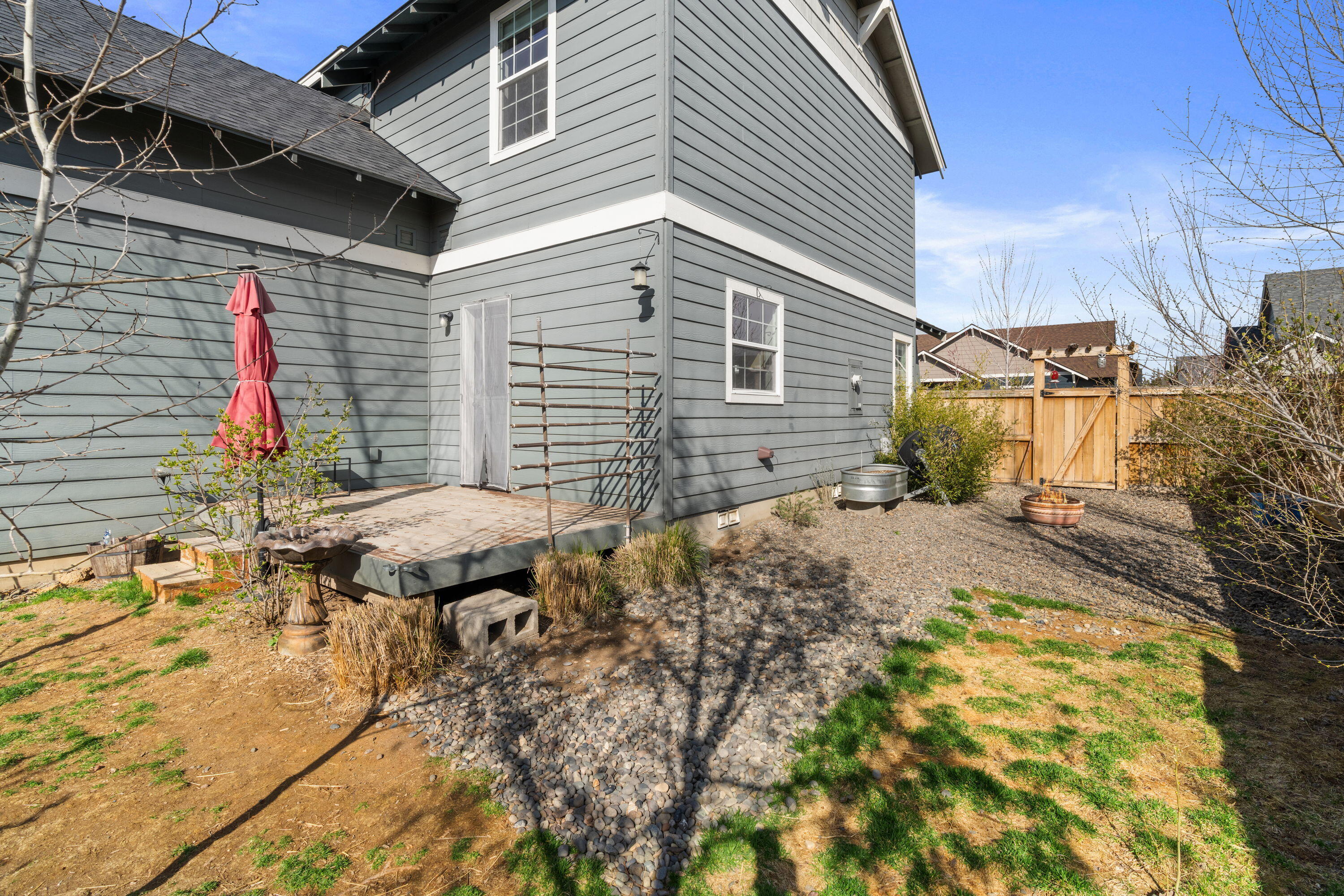 62713 Hawkview Road Bend, OR 97701 - Photo 25 of 33 Back deck and fenced yard
