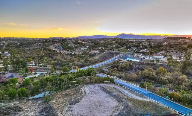 a view of a backyard with green space