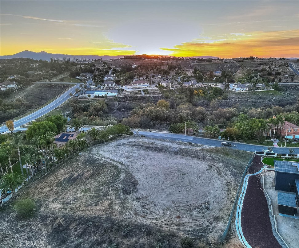 7390 Corinthian Way Riverside, CA 92506 - Photo 16 of 38 a view of a lake with a mountain