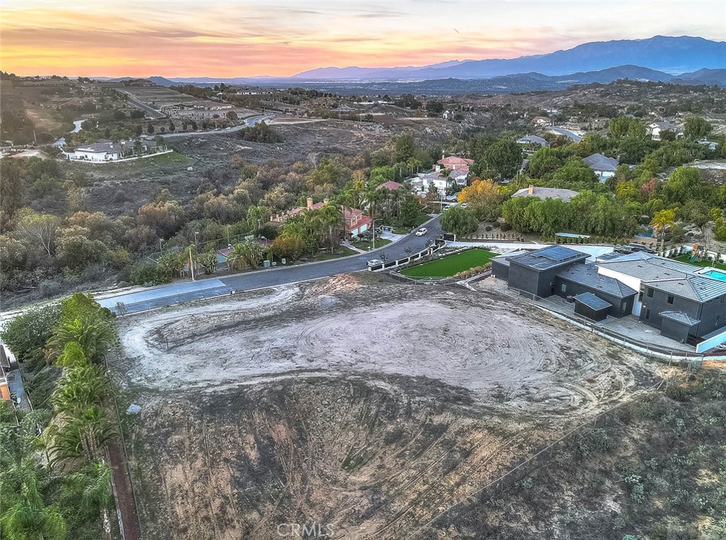 7390 Corinthian Way Riverside, CA 92506 - Photo 18 of 38 a view of a town with mountains in the background