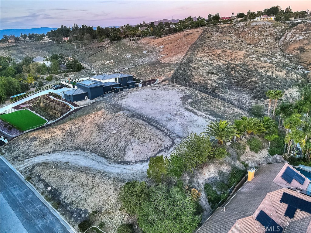 7390 Corinthian Way Riverside, CA 92506 - Photo 20 of 38 a view of a lake with a yard