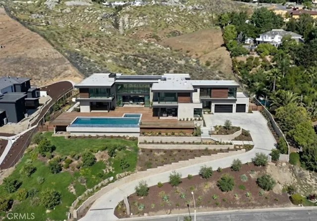 a view of a house with entrance gate