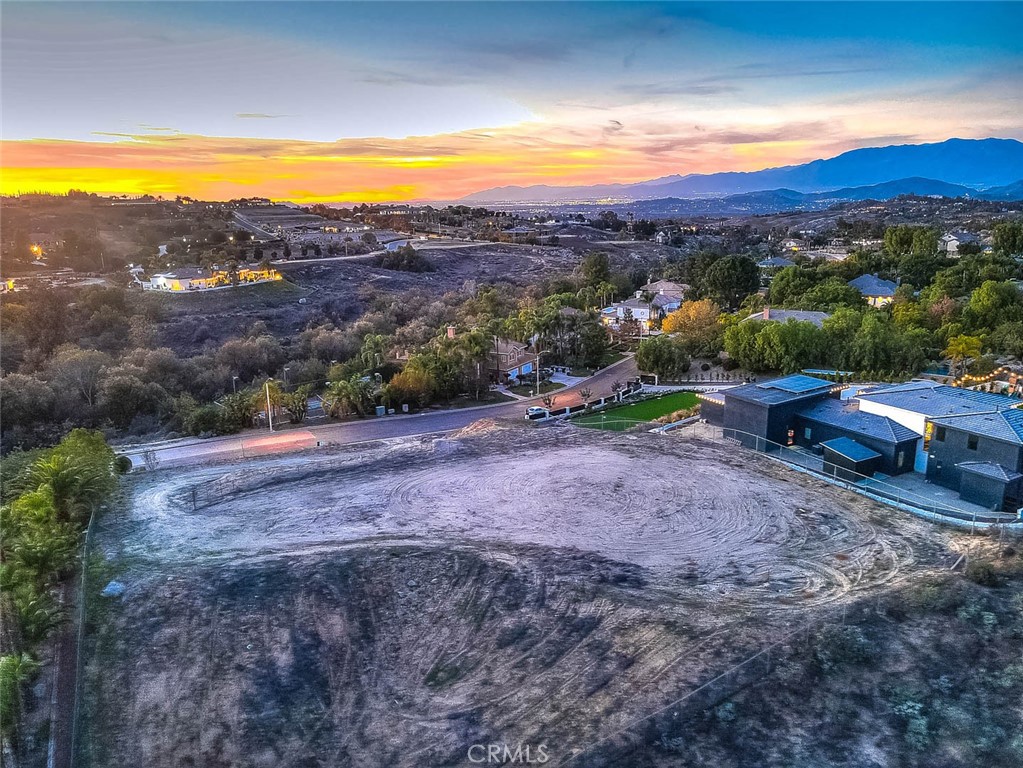 7390 Corinthian Way Riverside, CA 92506 - Photo 33 of 38 a view of a backyard with a mountain