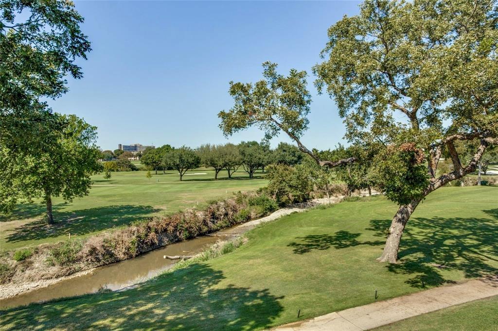 5981 Arapaho Road, Unit 901 Dallas, TX 75248 - Photo 11 of 38 a view of a garden with an outdoor space