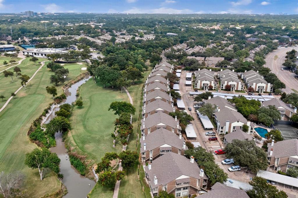 5981 Arapaho Road, Unit 901 Dallas, TX 75248 - Photo 12 of 38 an aerial view of a city with lots of residential buildings