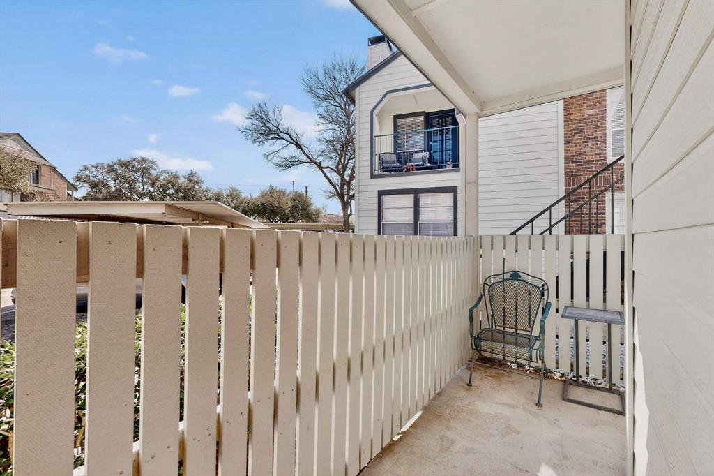 5981 Arapaho Road, Unit 901 Dallas, TX 75248 - Photo 14 of 38 a view of a house with wooden fence