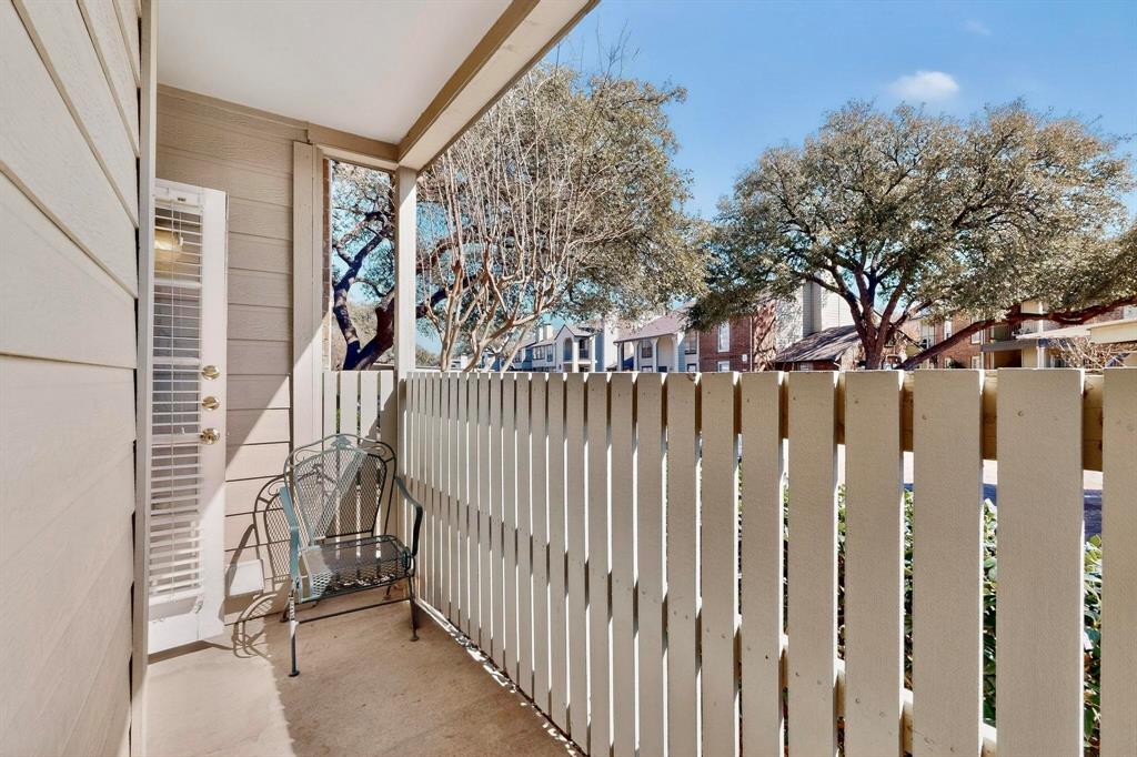5981 Arapaho Road, Unit 901 Dallas, TX 75248 - Photo 15 of 38 a view of a house with a wooden fence