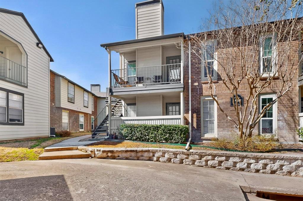5981 Arapaho Road, Unit 901 Dallas, TX 75248 - Photo 2 of 38 front view of a house with a street