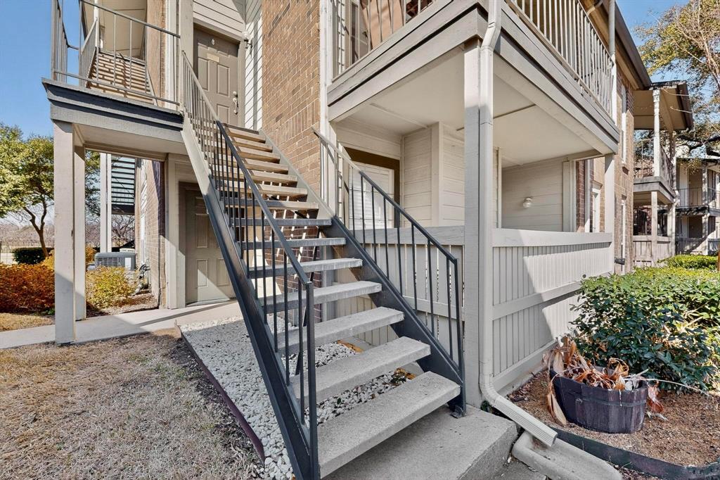 5981 Arapaho Road, Unit 901 Dallas, TX 75248 - Photo 31 of 38 a view of a house with a small yard and potted plants