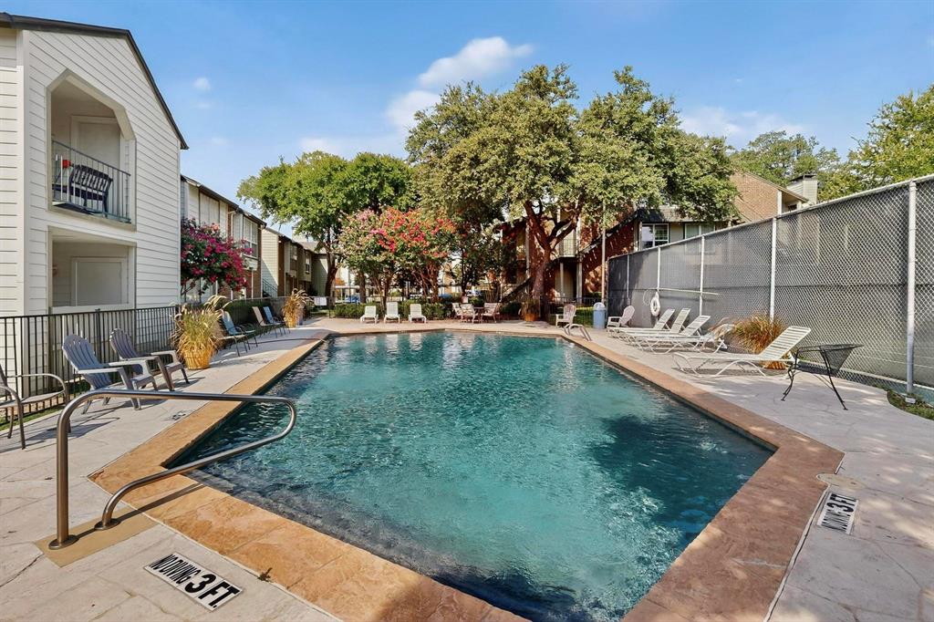 5981 Arapaho Road, Unit 901 Dallas, TX 75248 - Photo 32 of 38 a swimming pool with outdoor seating and yard