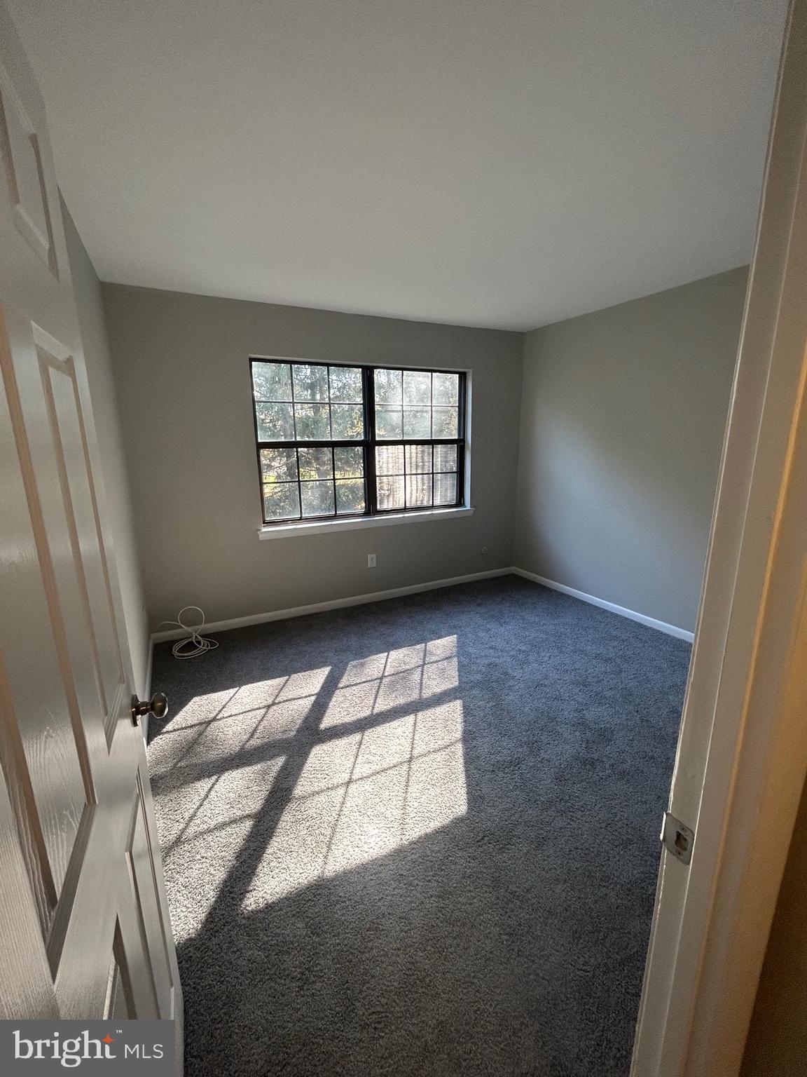 428 B Willow Turn Mount Laurel, NJ 08054 - Photo 9 of 16 an empty room with windows
