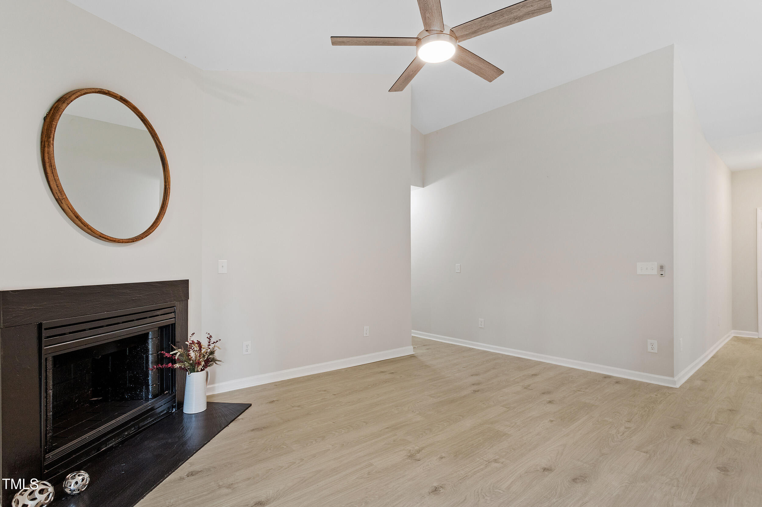 20 Meadowcrest Drive Durham, NC 27703 - Photo 14 of 28 a view of a livingroom with wooden floor and a fireplace