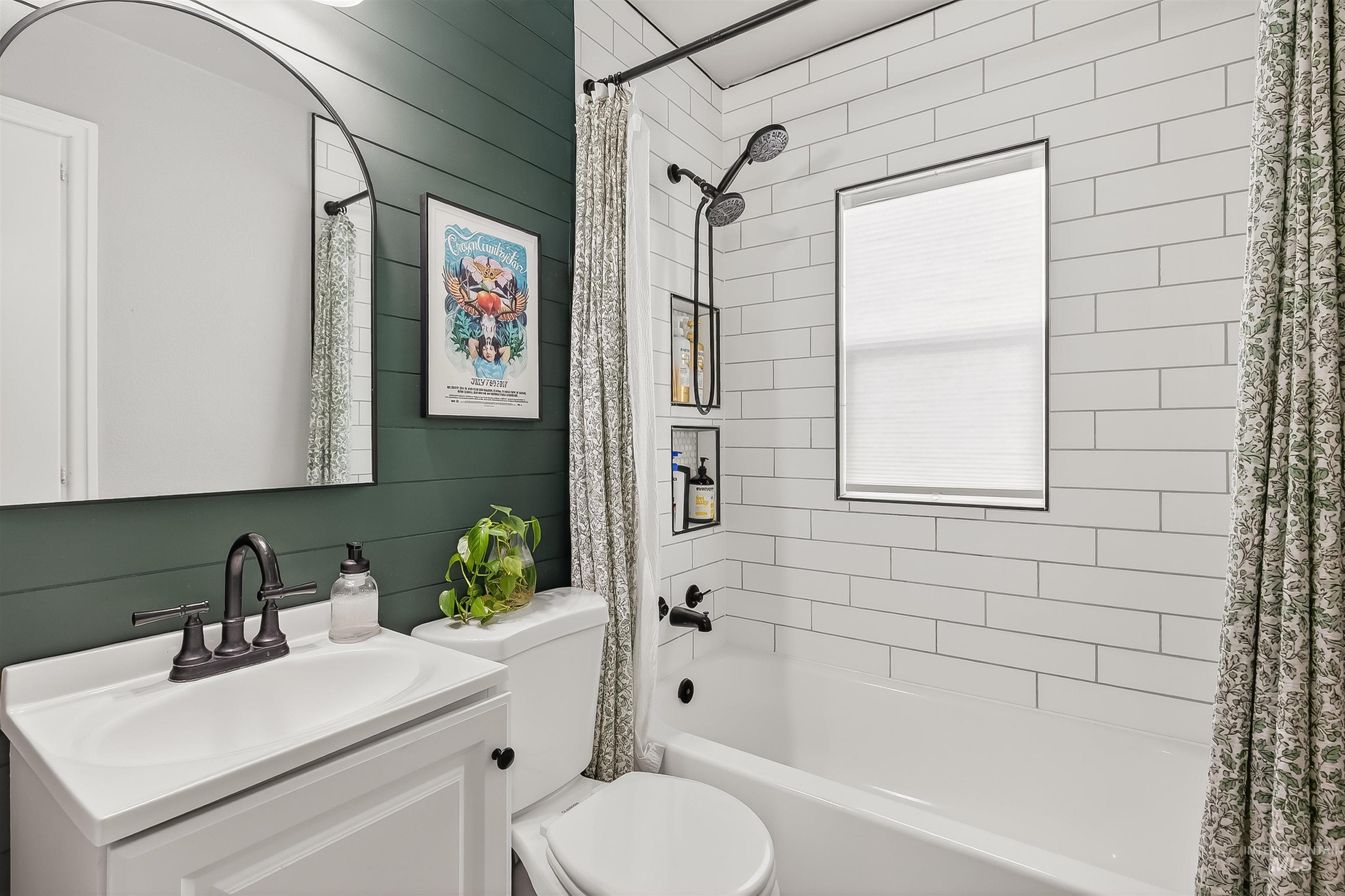 810 3rd Street Clarkston, WA 99403 - Photo 14 of 46 Full bath with shower / bath combo with shower curtain, vanity, and wood walls