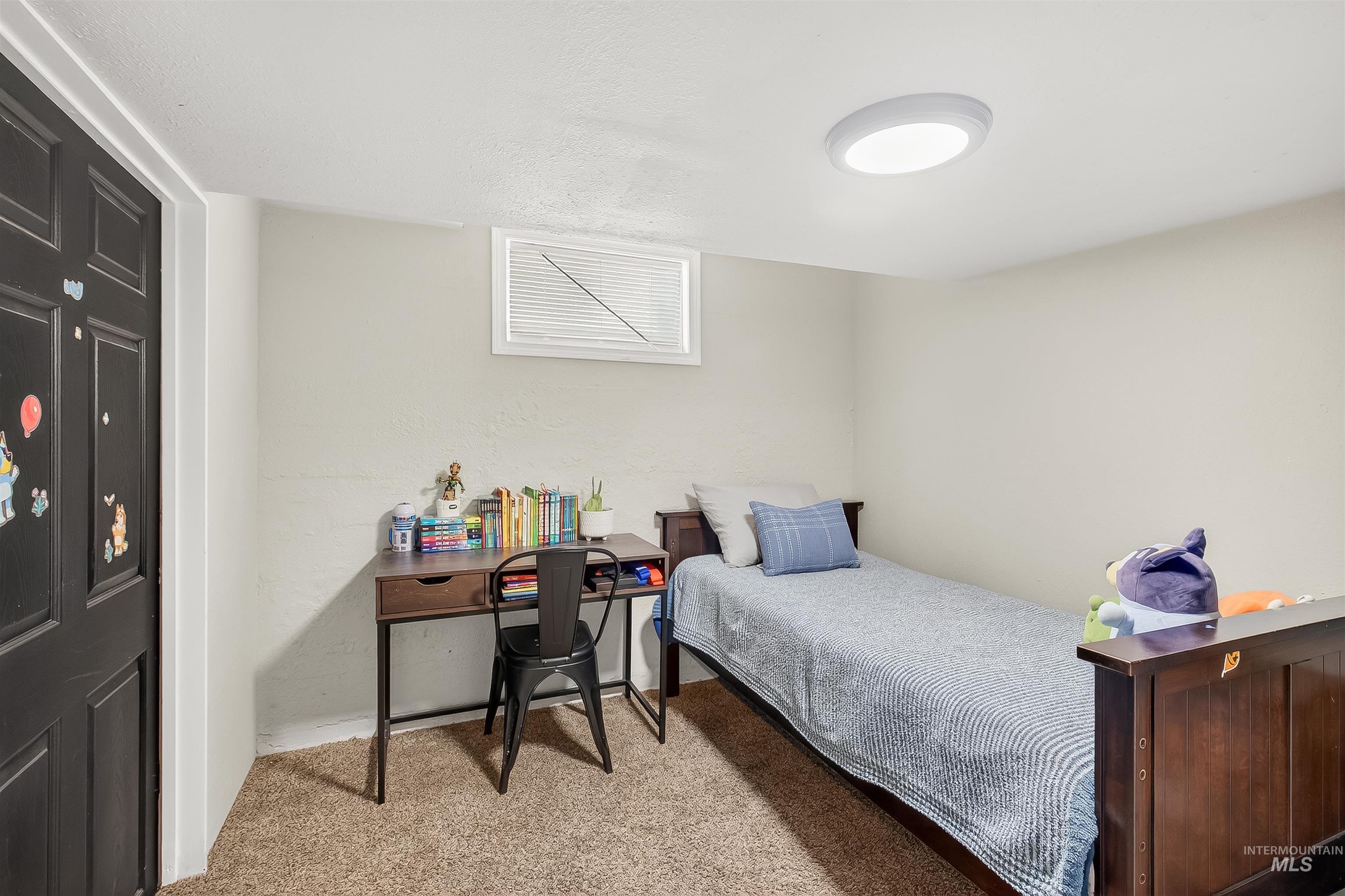810 3rd Street Clarkston, WA 99403 - Photo 31 of 46 Bedroom featuring light colored carpet and baseboards