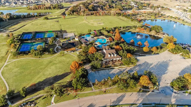 an aerial view of a pool patio patio and outdoor seating