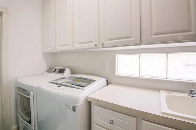a view of a chairs and table in the patio