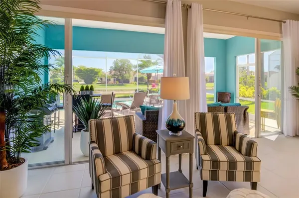 an aerial view of a residential houses with outdoor space