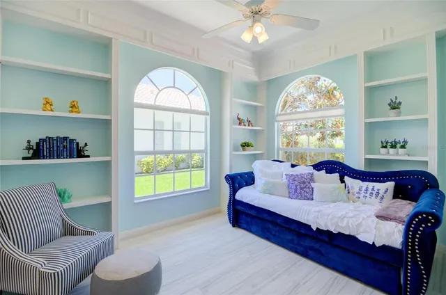 a living room with furniture and a window