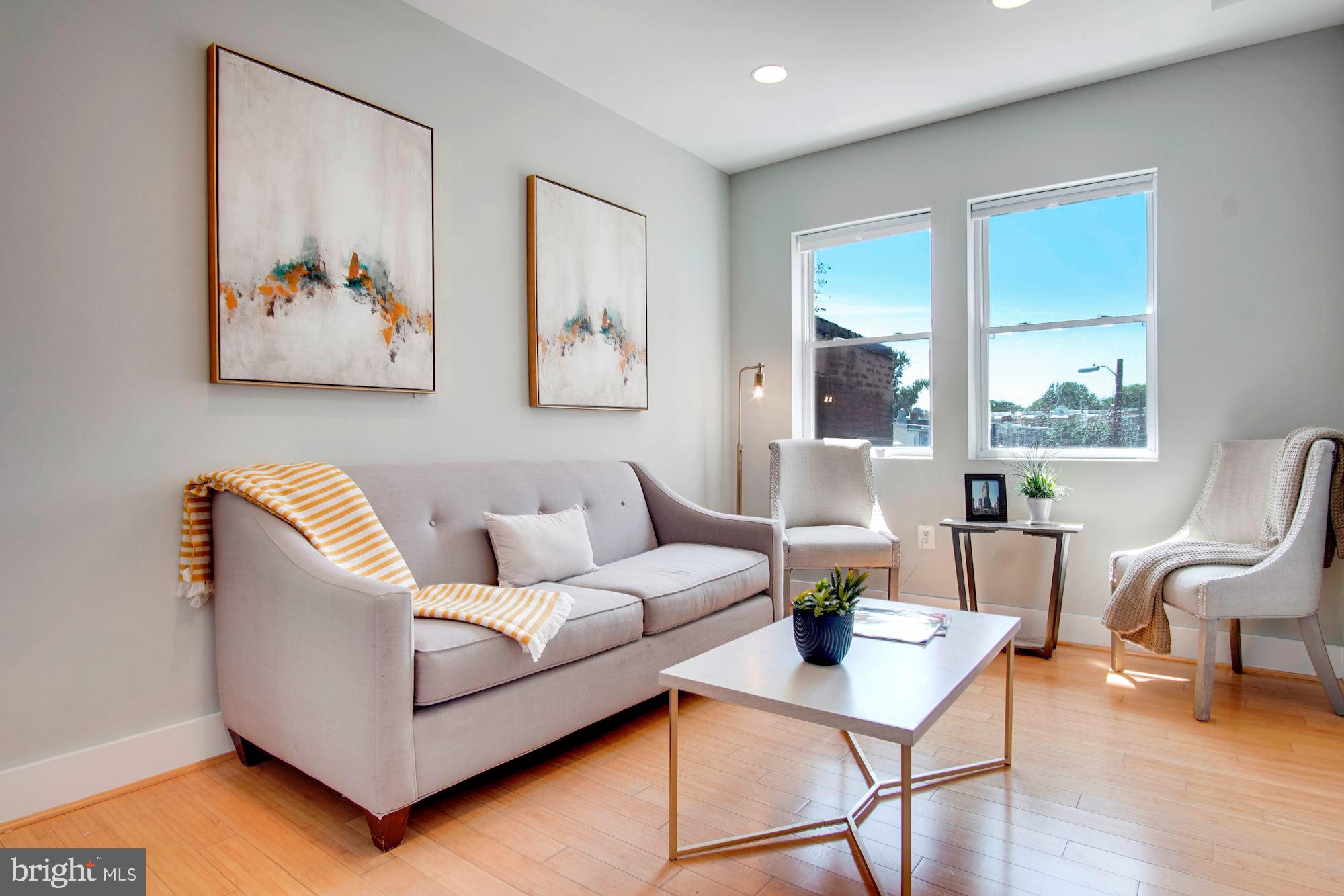 1409 G Street Northeast, Unit 21 Washington, DC 20002 - Photo 12 of 27 The cozy den just off the main living area