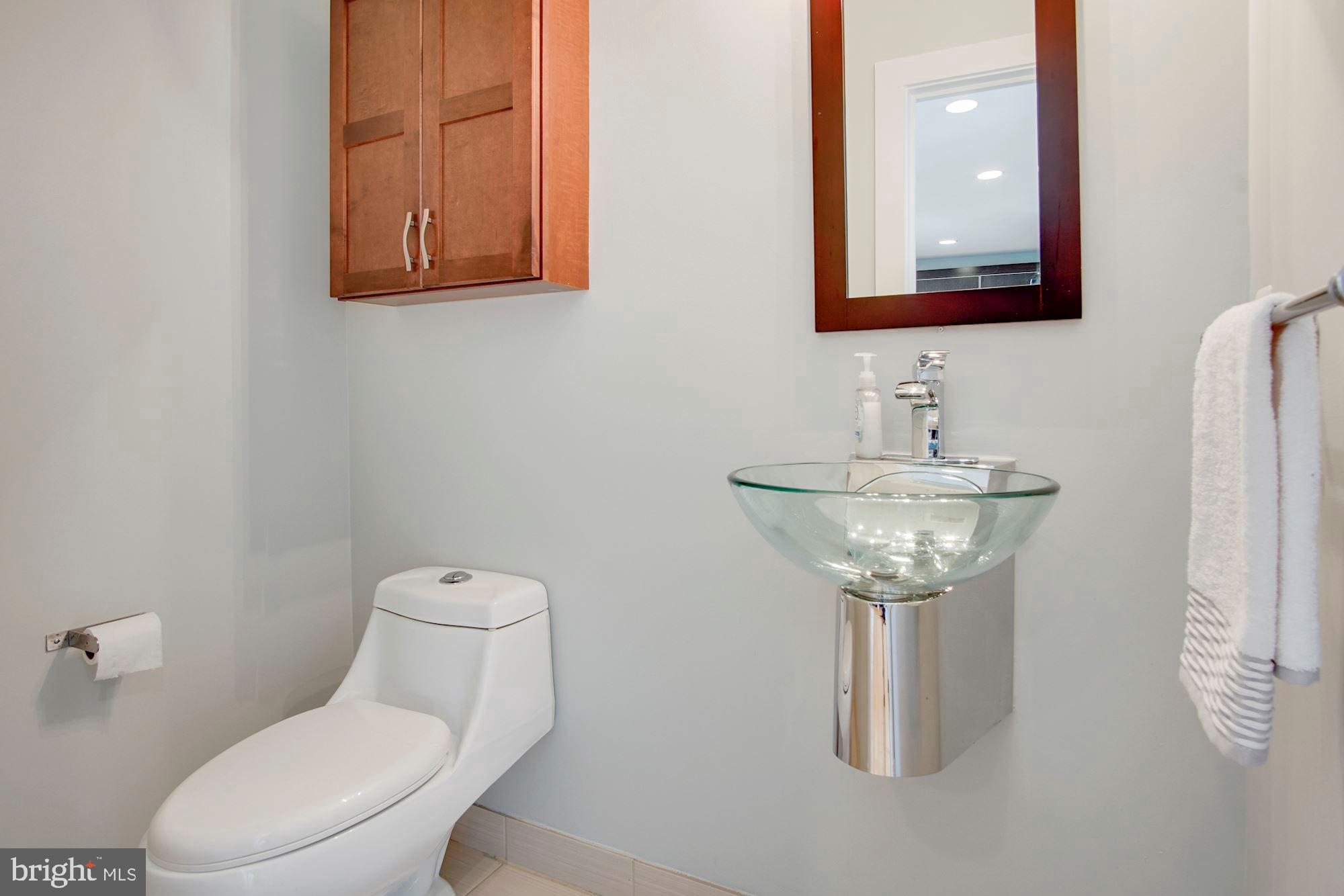 1409 G Street Northeast, Unit 21 Washington, DC 20002 - Photo 14 of 27 Main level powder room