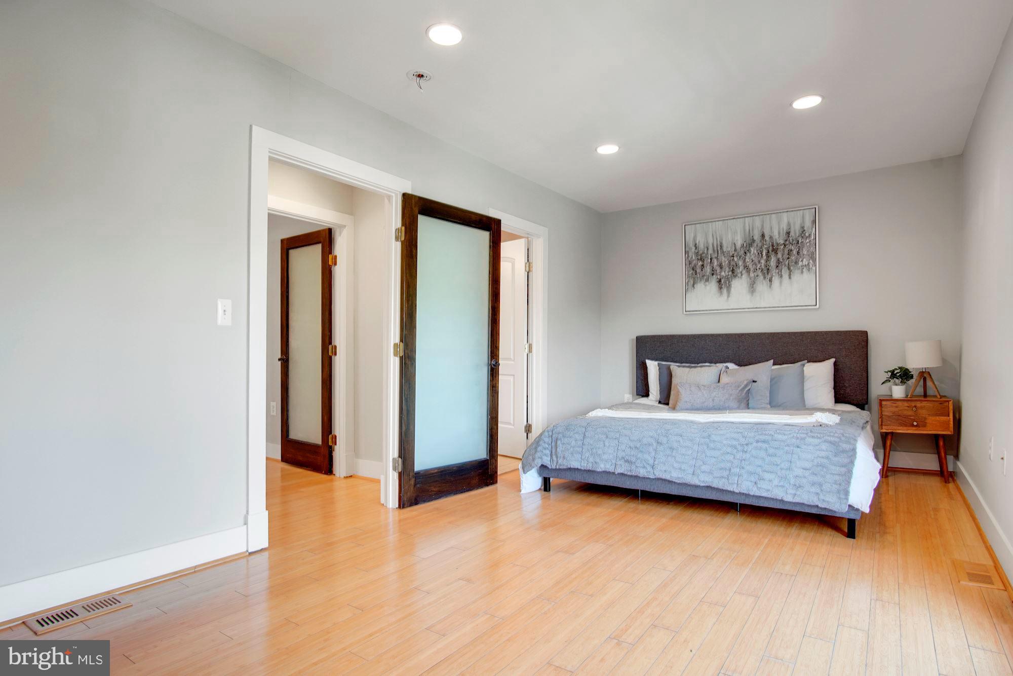 1409 G Street Northeast, Unit 21 Washington, DC 20002 - Photo 15 of 27 Owner's suite with room for a king bed