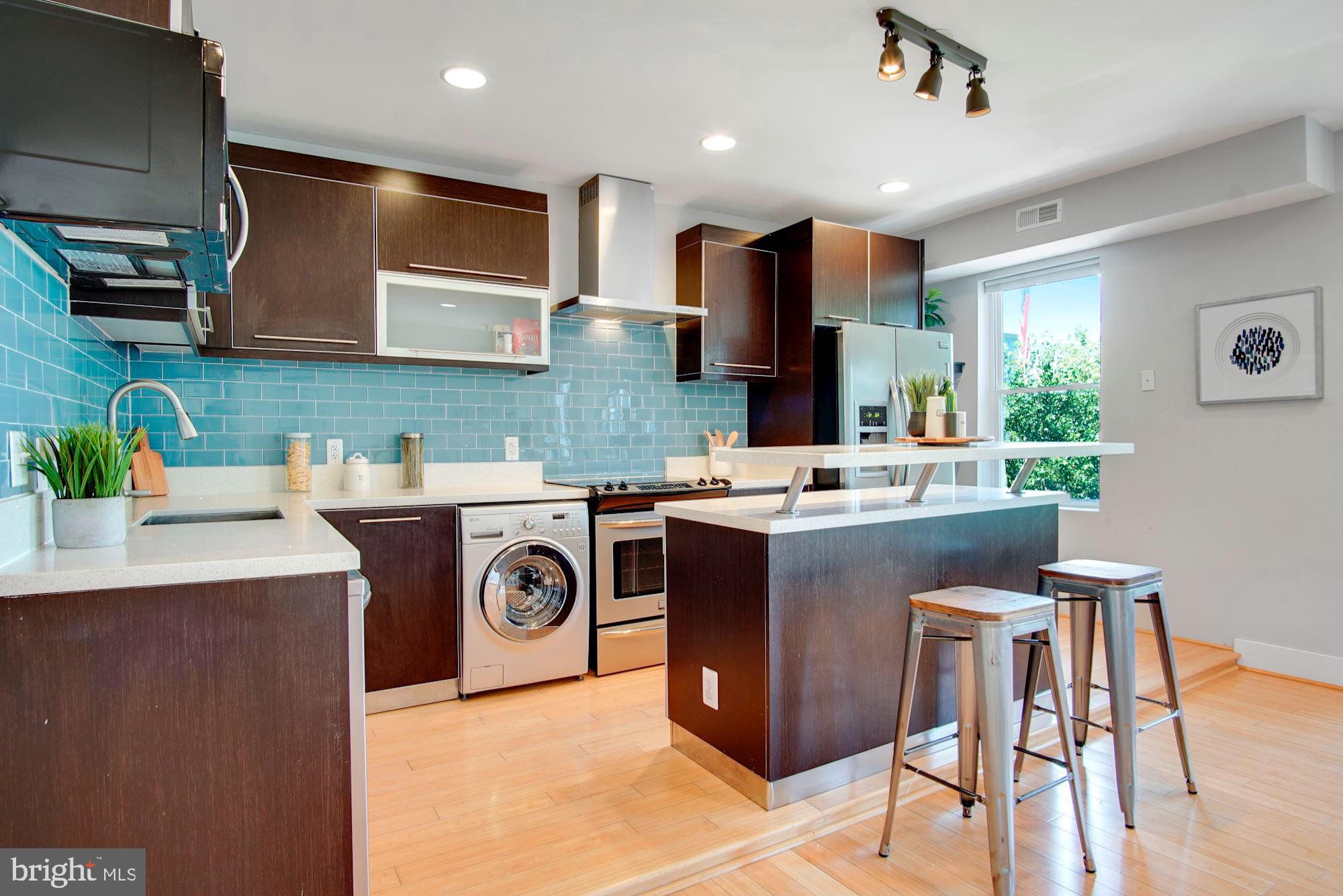 1409 G Street Northeast, Unit 21 Washington, DC 20002 - Photo 4 of 27 Modern kitchen, flooded with light