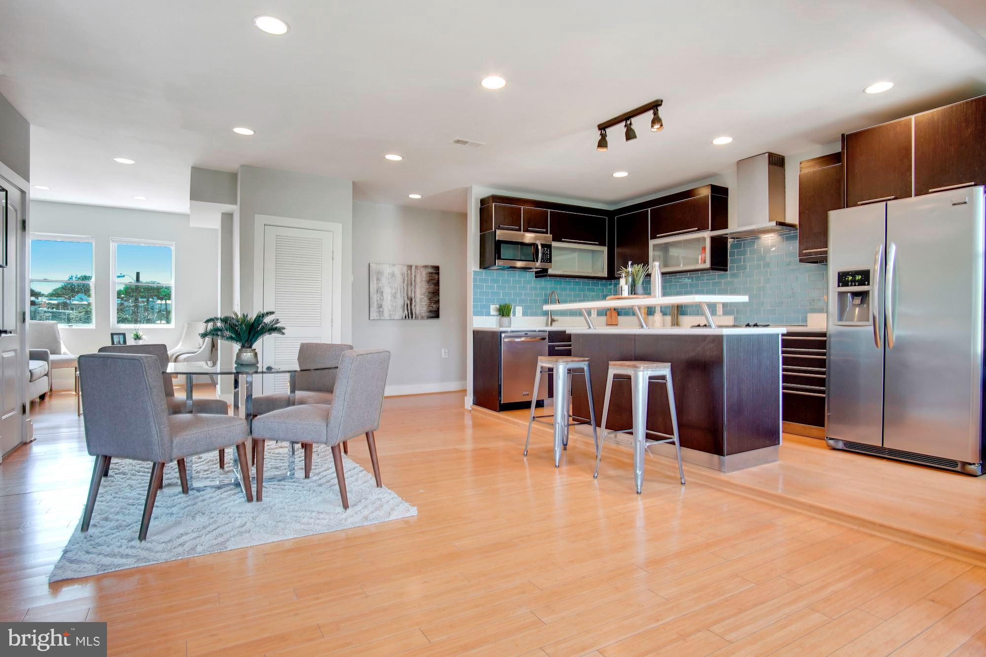1409 G Street Northeast, Unit 21 Washington, DC 20002 - Photo 5 of 27 Open kitchen to living and dining areas