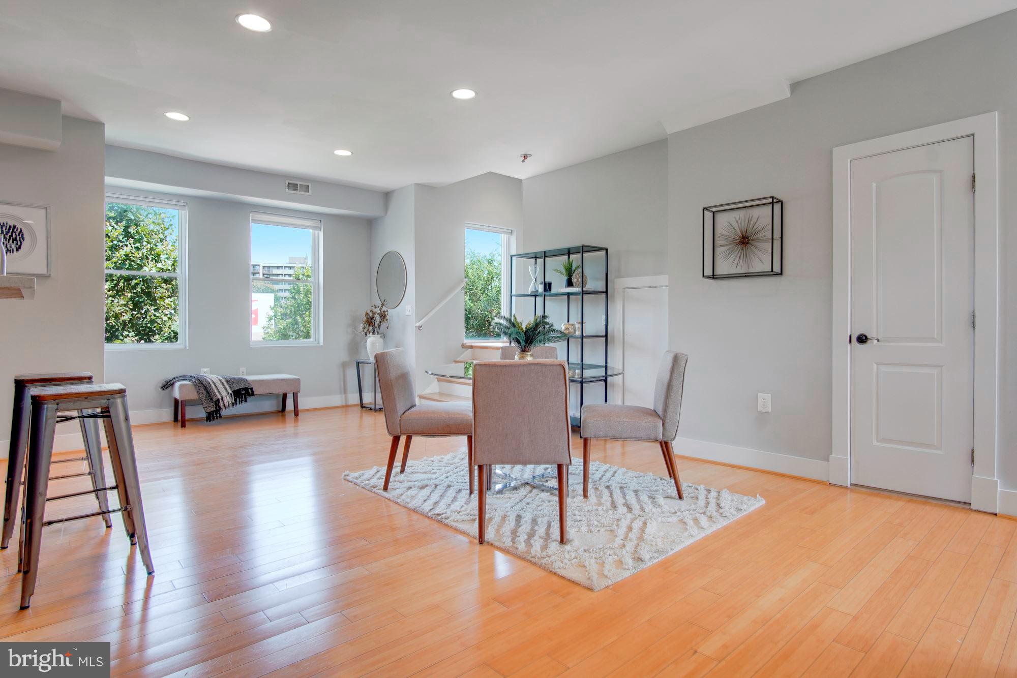 1409 G Street Northeast, Unit 21 Washington, DC 20002 - Photo 9 of 27 Dining and living areas, perfect for entertaining
