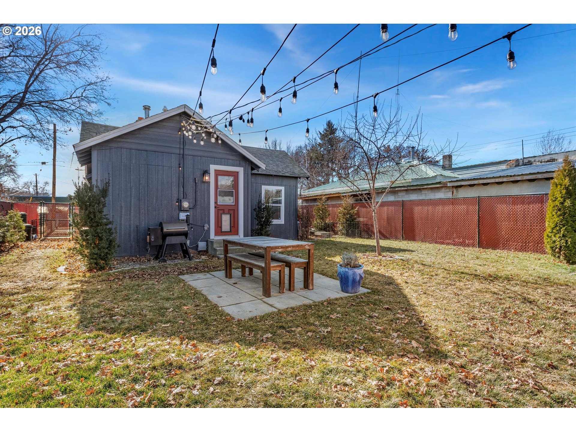 1660 Church Street Baker City, OR 97814 - Photo 24 of 25 a view of a backyard with furniture and a garage
