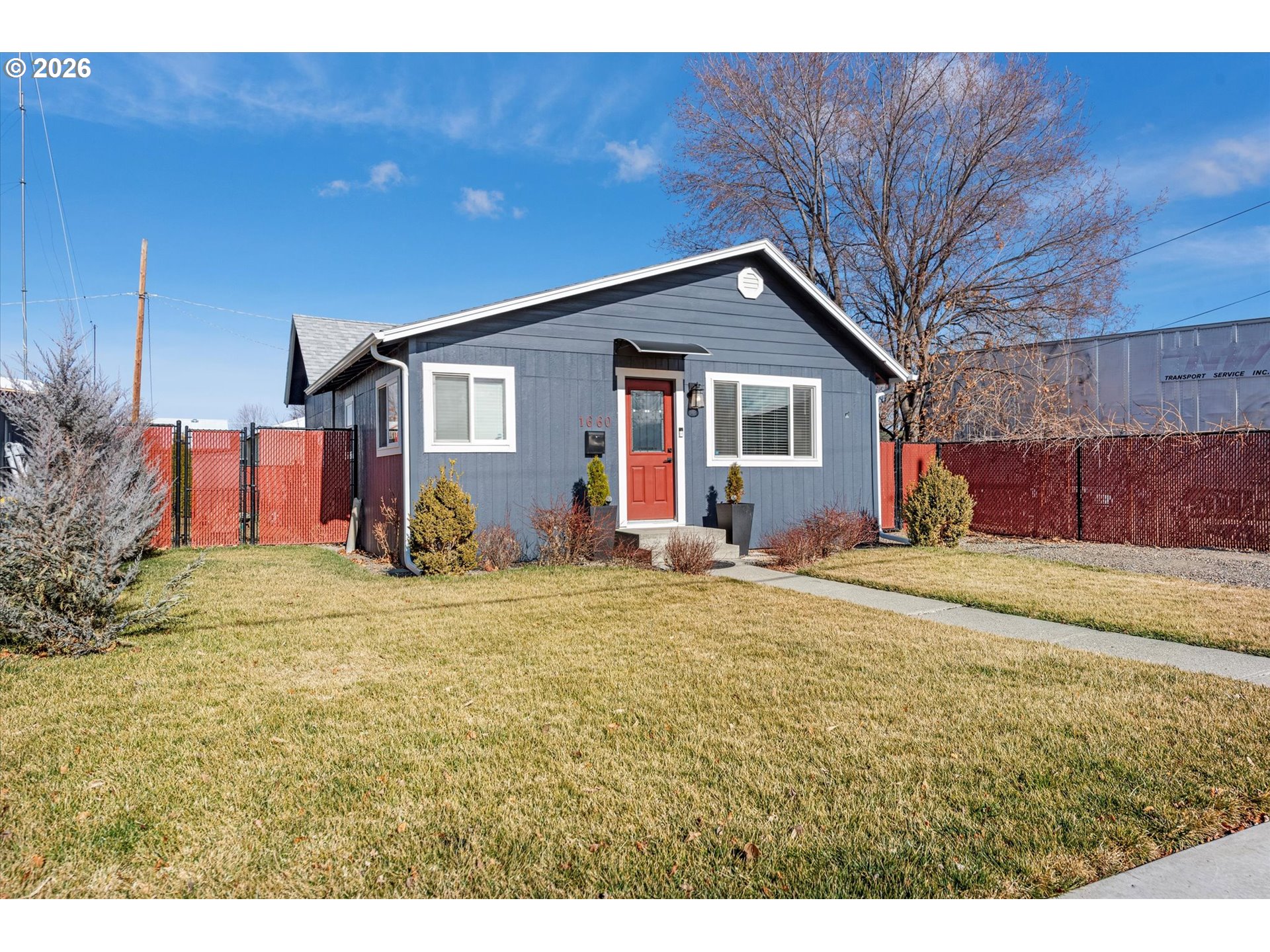1660 Church Street Baker City, OR 97814 - Photo 3 of 25 a view of a house with a yard and garage