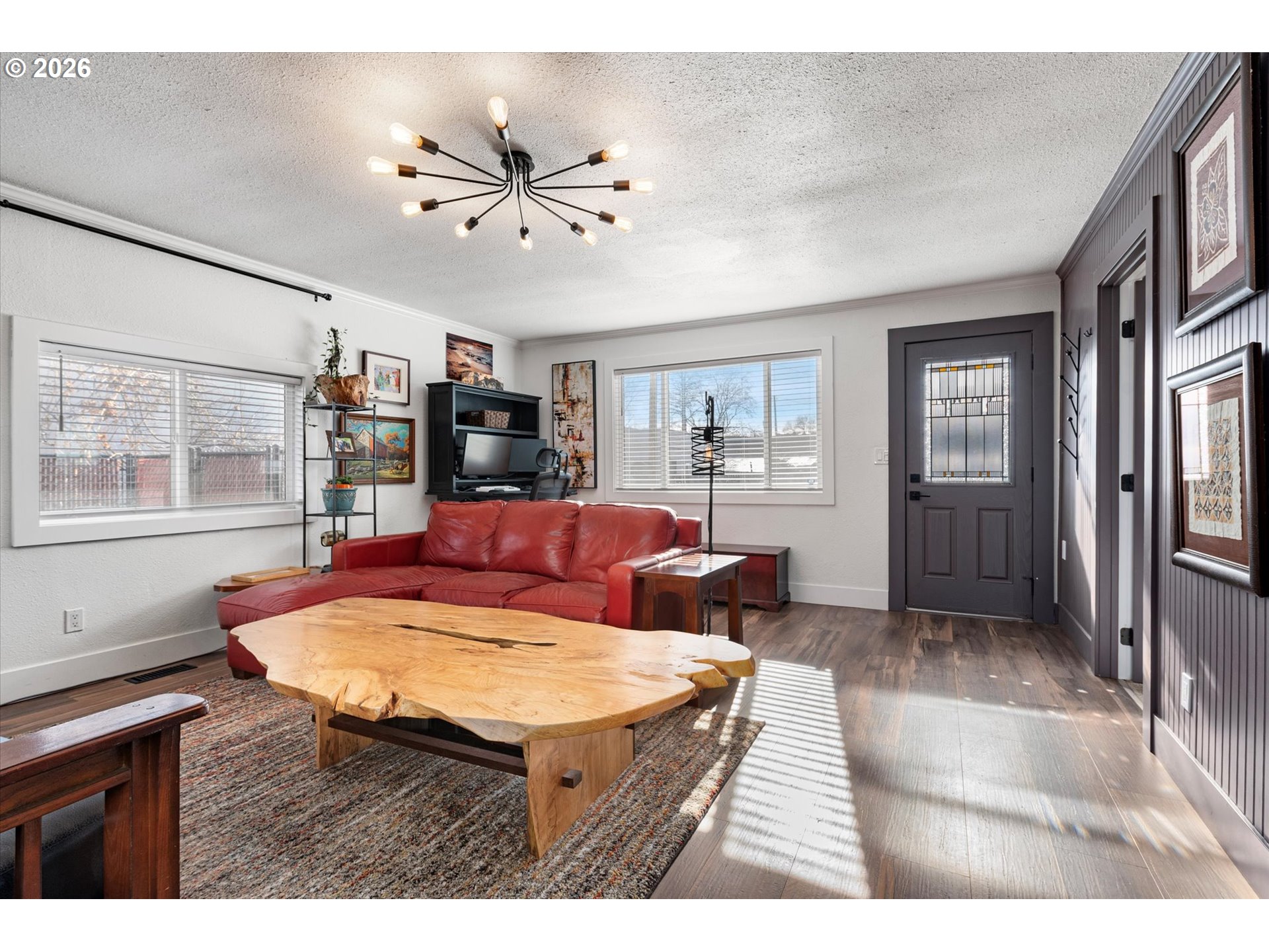 1660 Church Street Baker City, OR 97814 - Photo 6 of 25 a living room with furniture a chandelier and a dining table