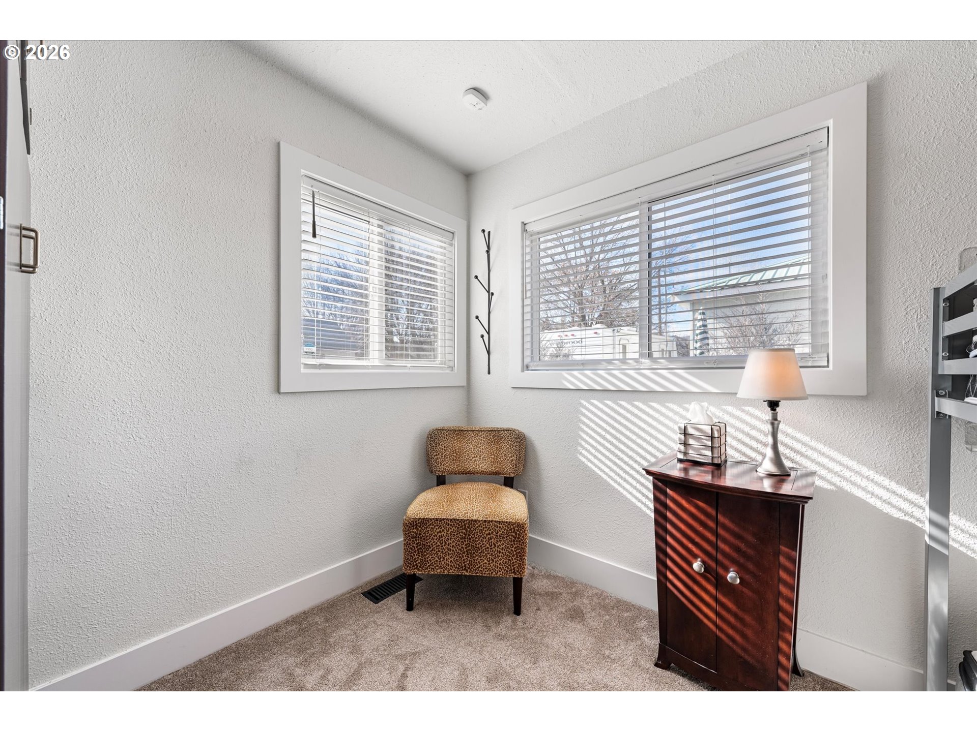 1660 Church Street Baker City, OR 97814 - Photo 8 of 25 a bedroom with a bed and a window