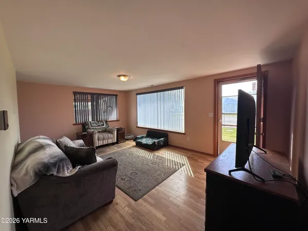 a living room with furniture and window