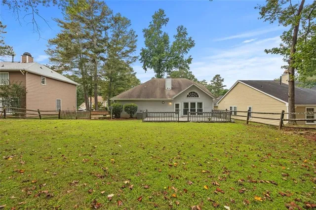 a house with garden in front of it