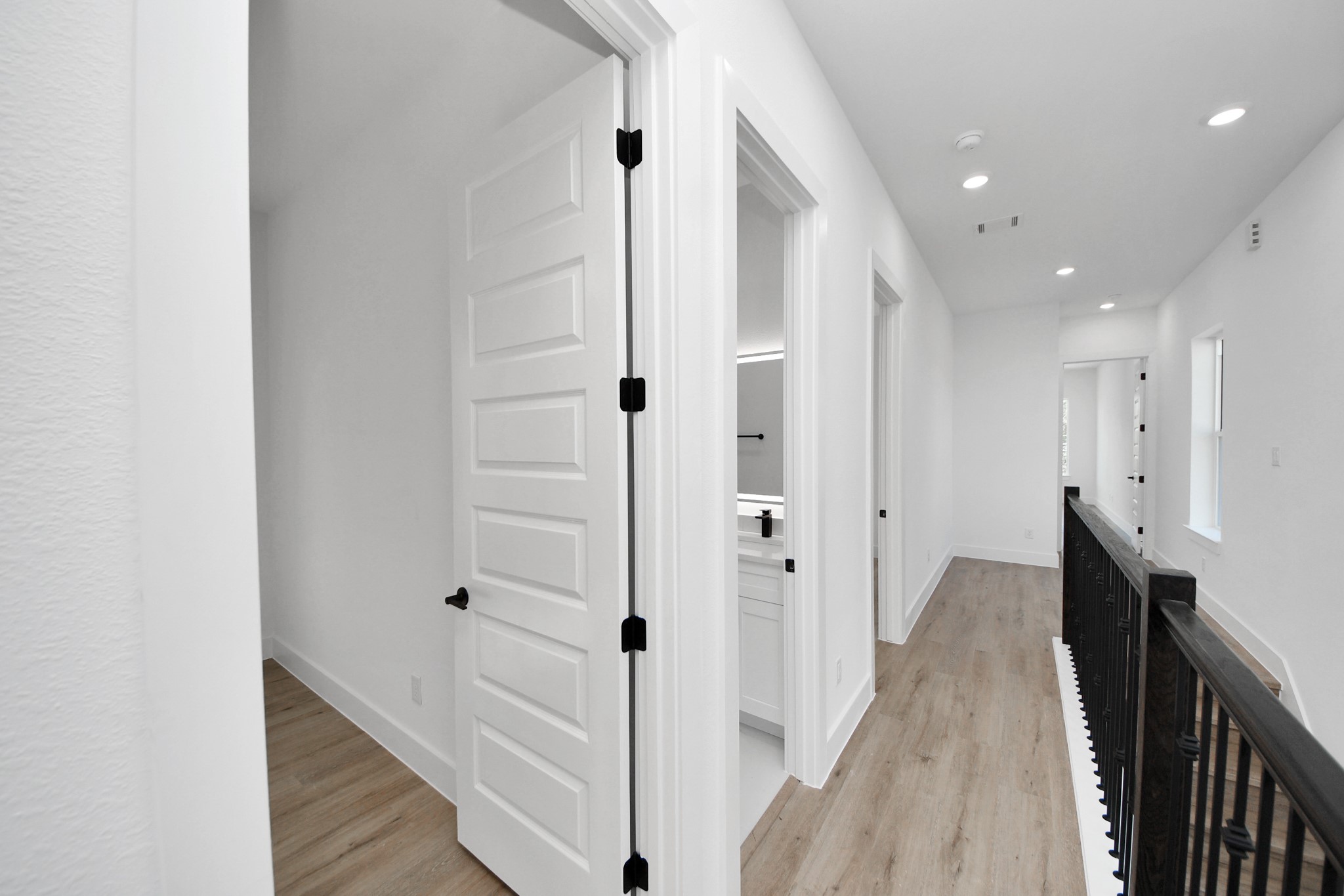 3310 Hardy Street Houston, TX 77009 - Photo 14 of 26 a view of hallway with wooden floor