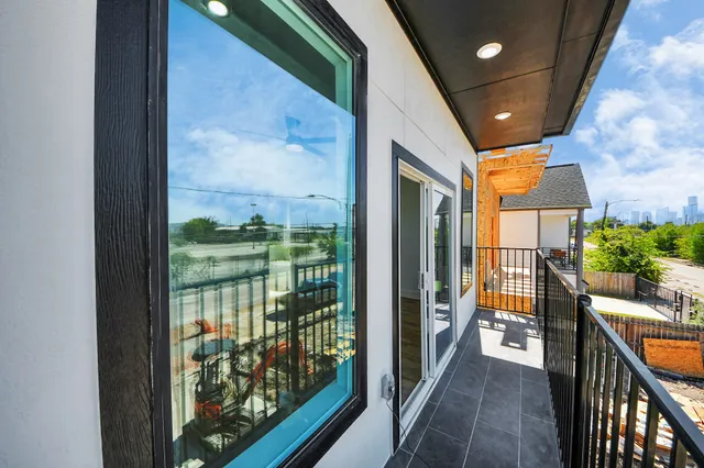 a view of a entryway door front of a house