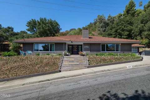 front view of house with a small yard